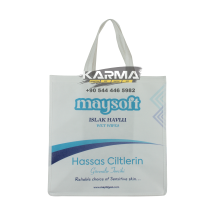 Beyaz gövde üzerinde mavi-yeşil dalga çizgileri ve kısa beyaz kulplar. Dikişli tela fuar çantası.